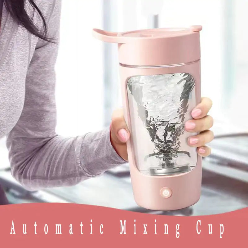 Pink electric shaker cup with automatic mixing feature.