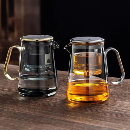 Glass teapots with golden and silver handles, featuring a magnetic switch for tea separation.