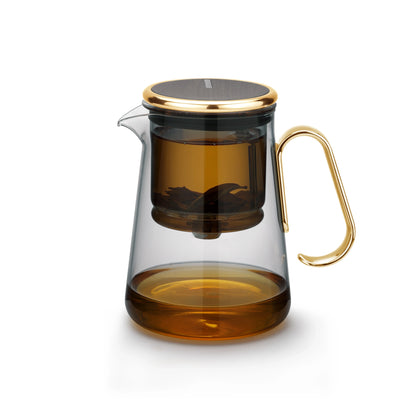 Elegant glass teapot with magnetic switch and golden handle for easy tea brewing.