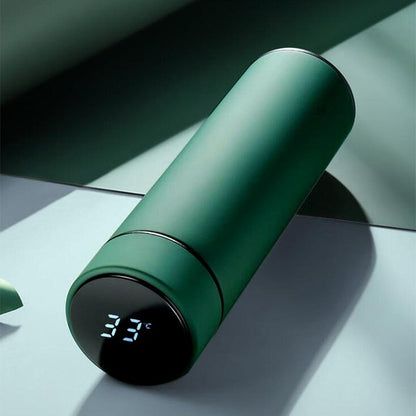 Smart water bottle in green stainless steel with digital display for hydration tracking.