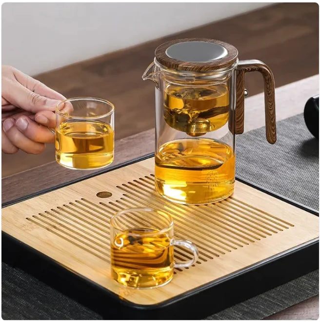 Elegant glass teapot with water separation on wooden tray, part of Comfort Life - Tea Set.