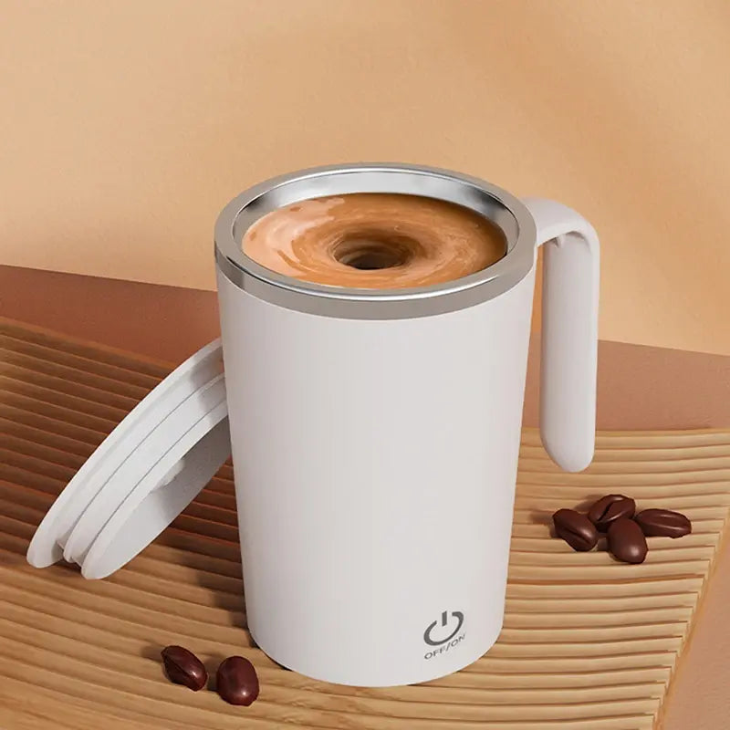 Automatic self-stirring magnetic mug with coffee whirlpool effect and handle on wooden mat